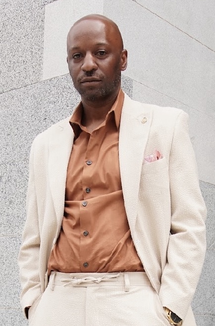 Paris Moore — Shop Manager · Barber